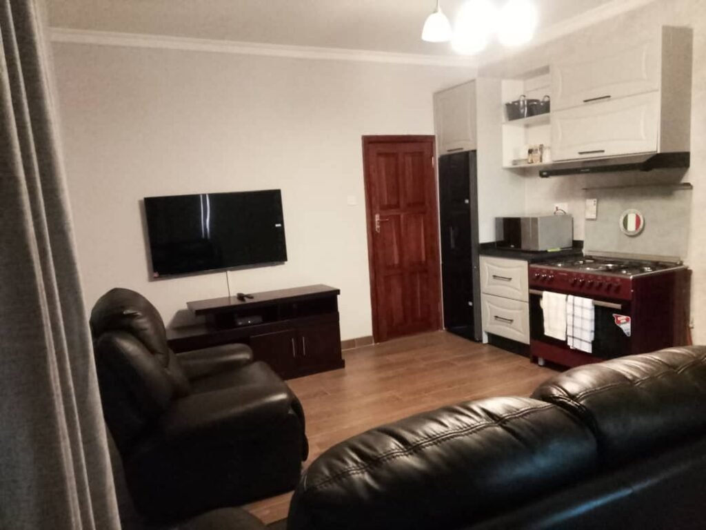 Spacious living room area for relaxation at Kylelikwe Park, a premier guest house in Masvingo.