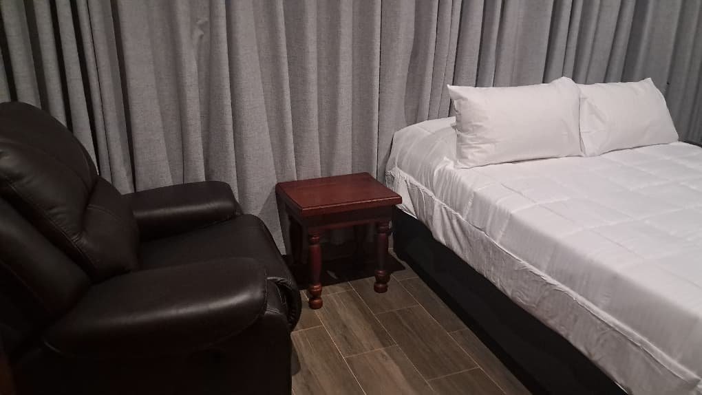 Comfortable bedroom in a self-catering cottage at our guest house in Masvingo.