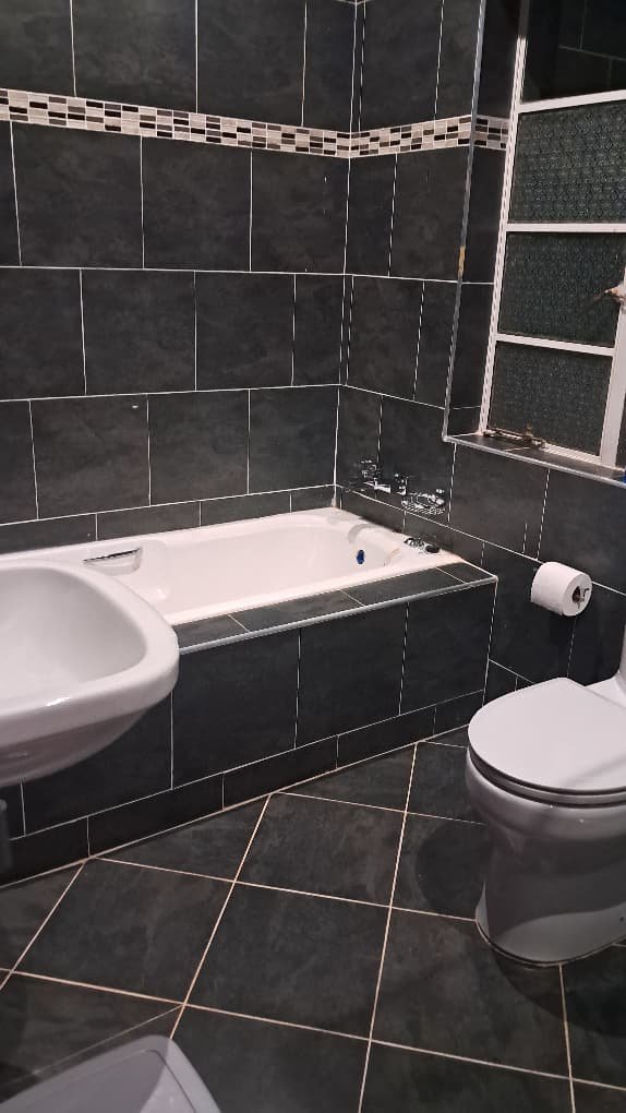 Modern and clean private bathroom in our guest house in Masvingo accommodations.